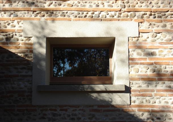 Rénovation façade briques et cailloux