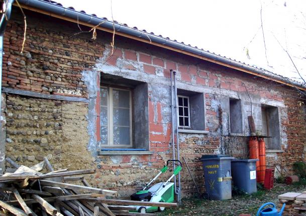 Rénovation façade briques et cailloux