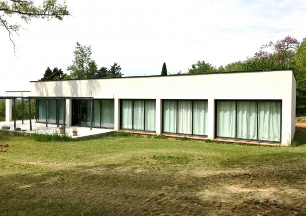 création maison toit plat